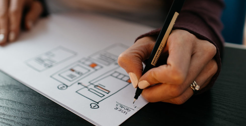 Person writing on paper