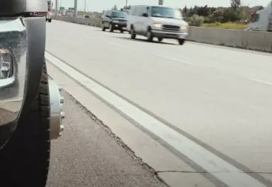 Cars driving by on a highway