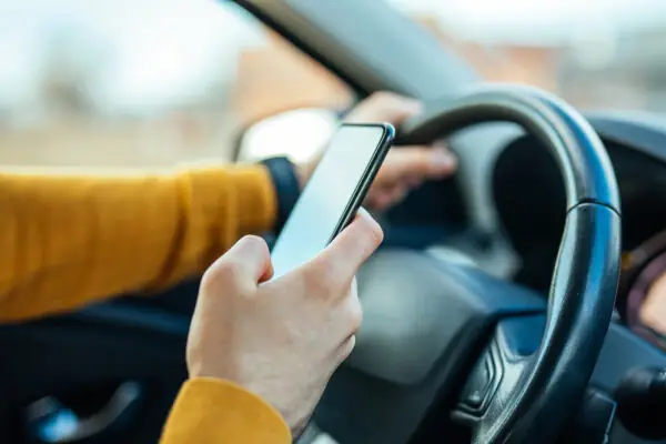 Person using phone when driving