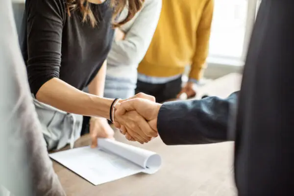 Two people shaking hands