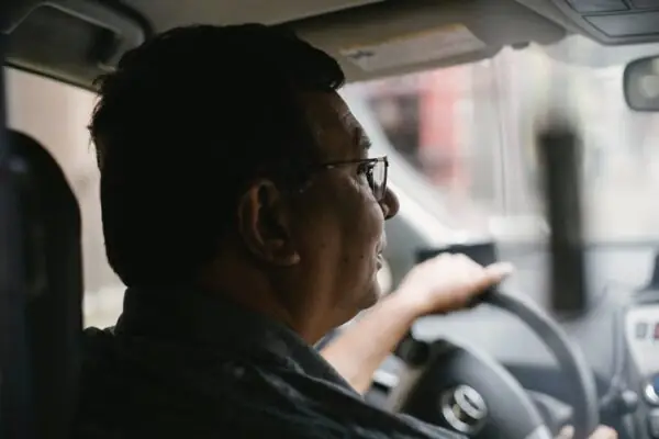 Senior person driving a vehicle