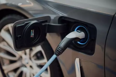 Electric vehicle with charging plug