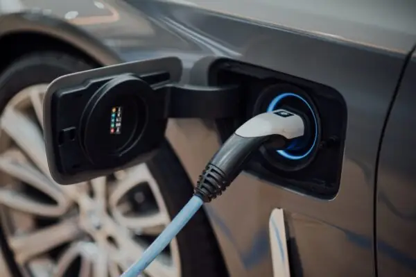 Electric vehicle with charging plug